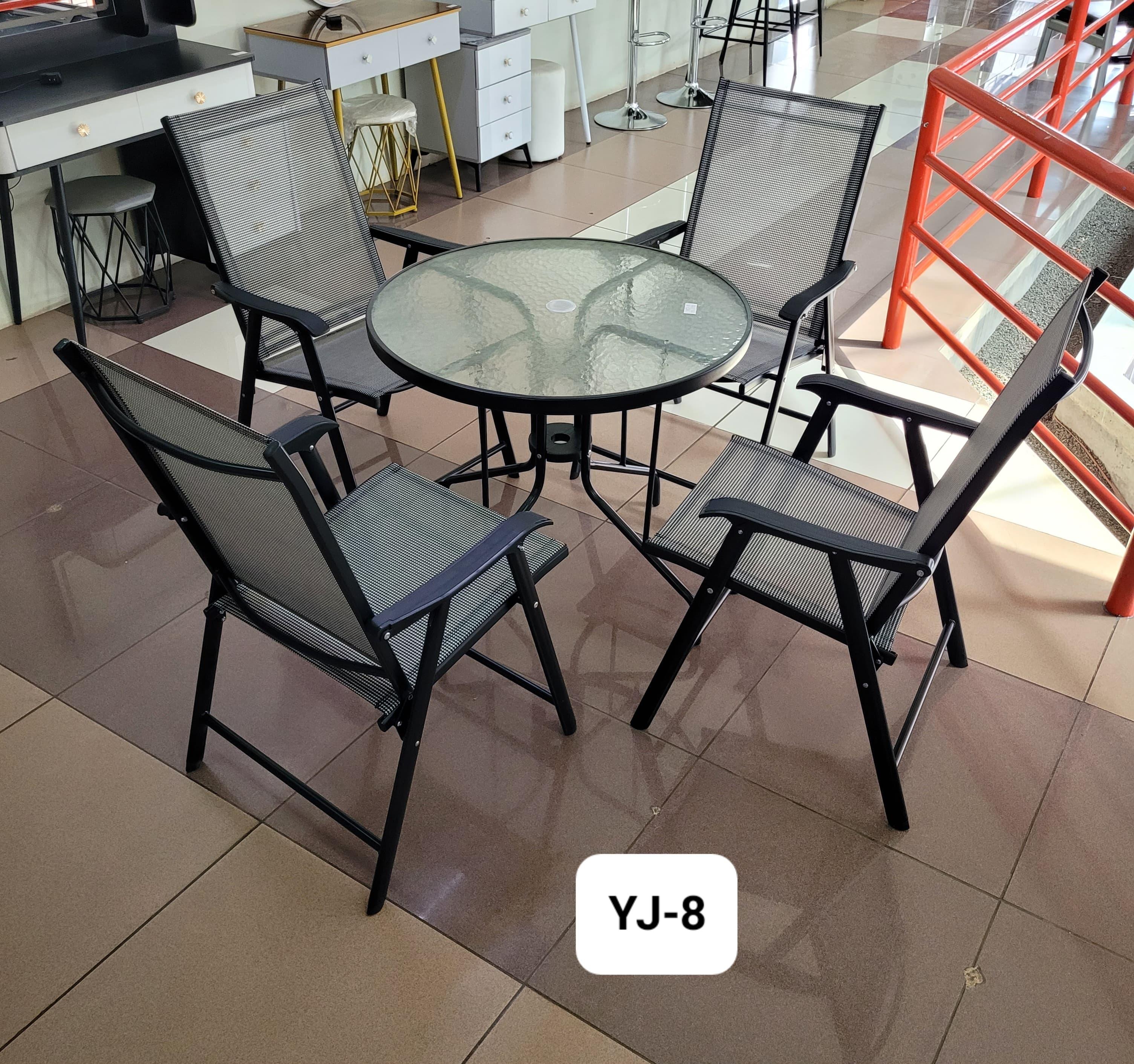 foldable outdoor garden table and 4 foldable chairs set in kenya by mwajo